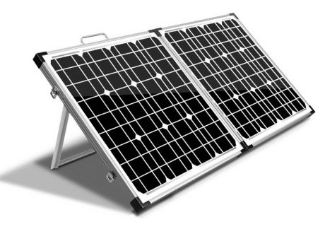 Camping solar panels on a sloped frame.